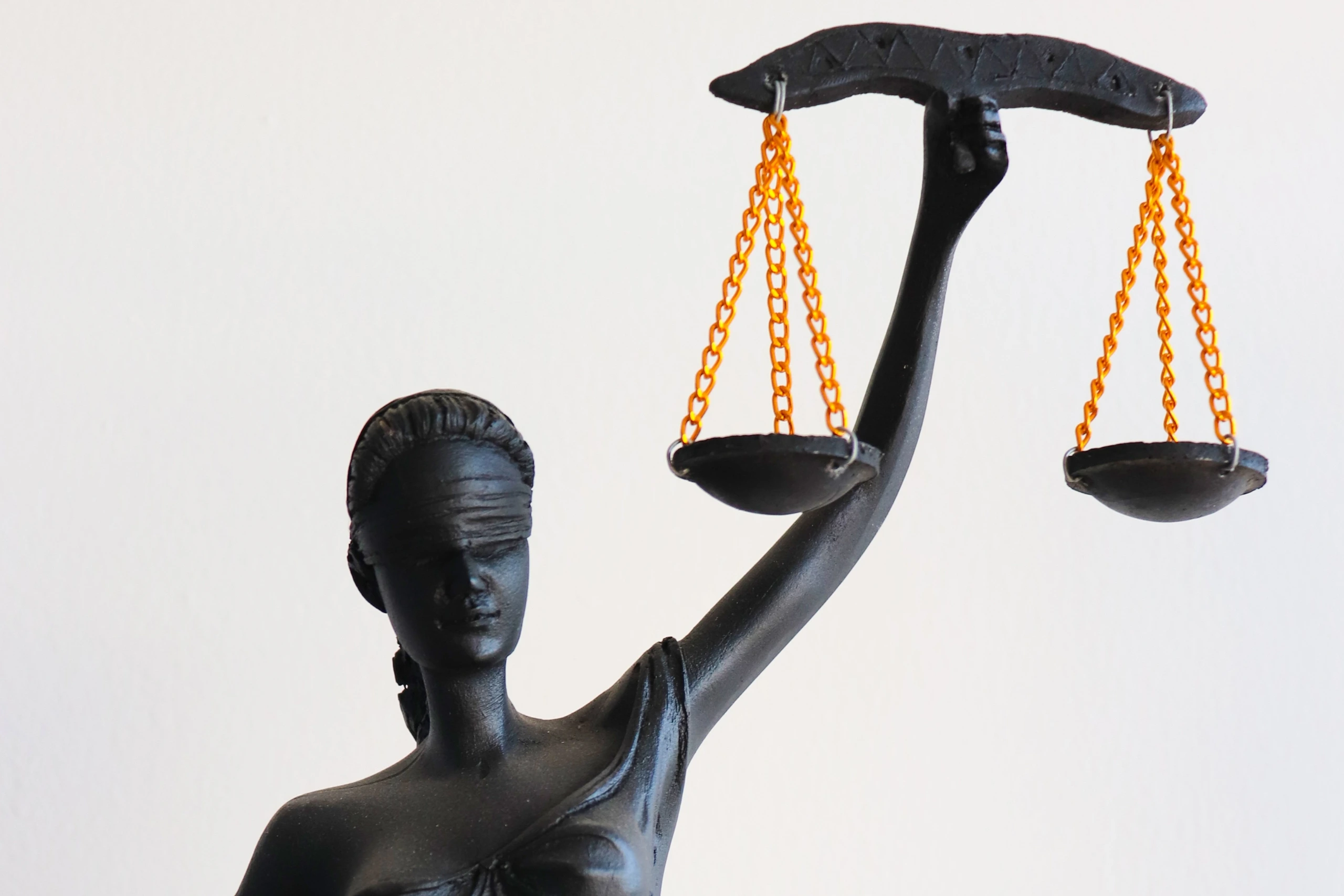 Lady Justice statue with scales, symbol of justice