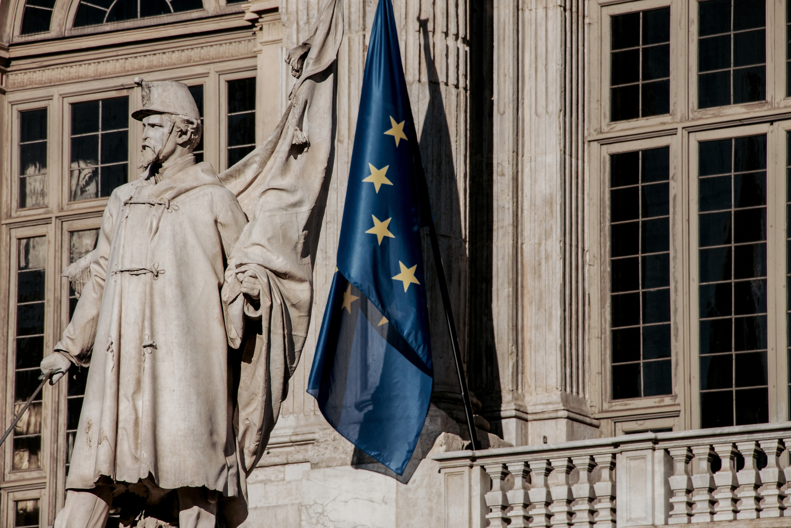 European Union flag in front of a historic building