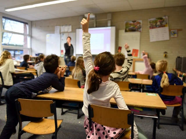 Classroom lecture with students and a lecturer