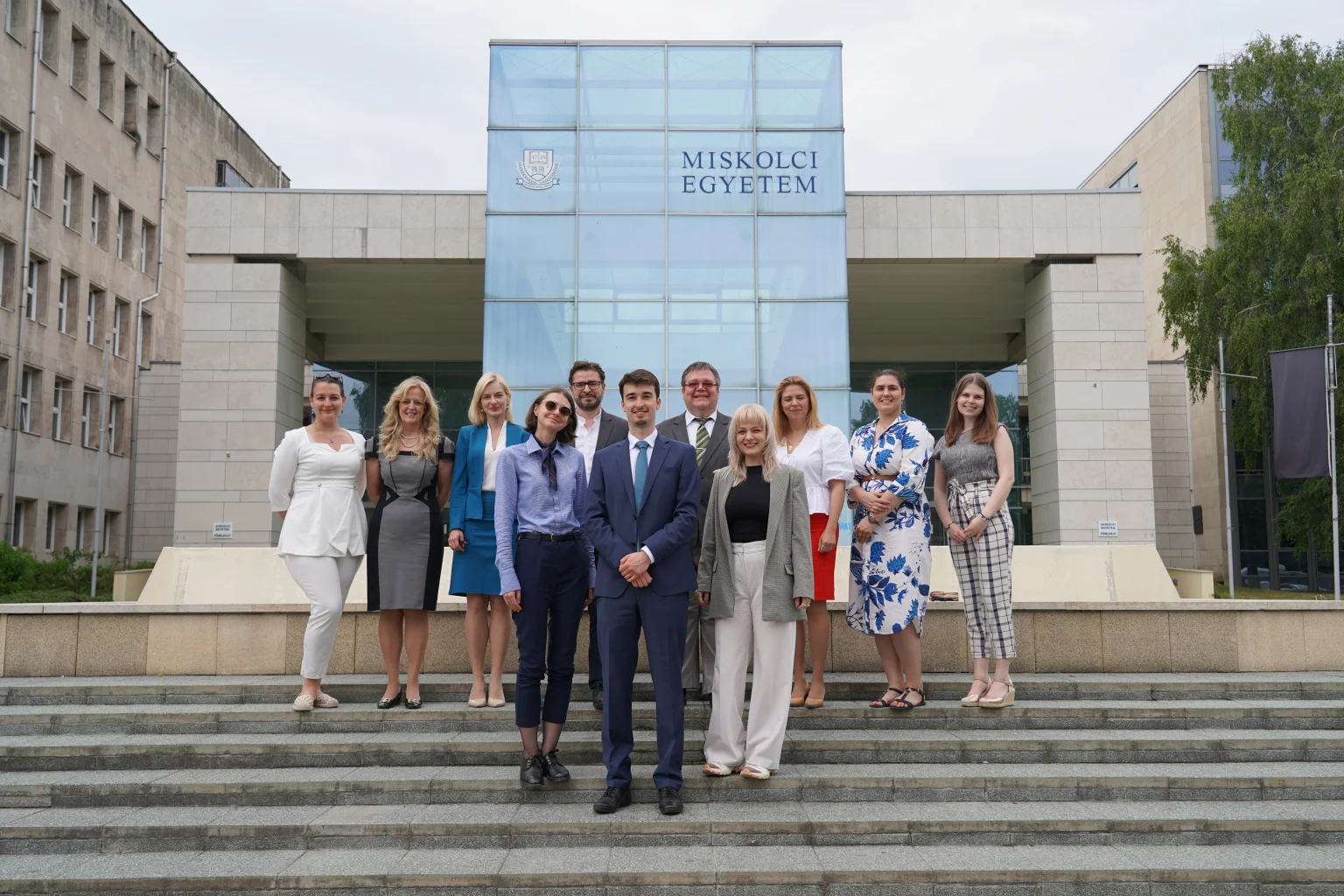 Group photo in front of the main building of the University of Miskolc