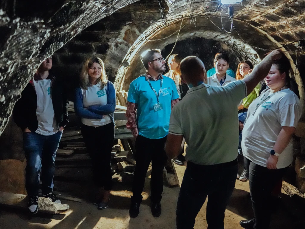 Group on a guided tour at a cave location