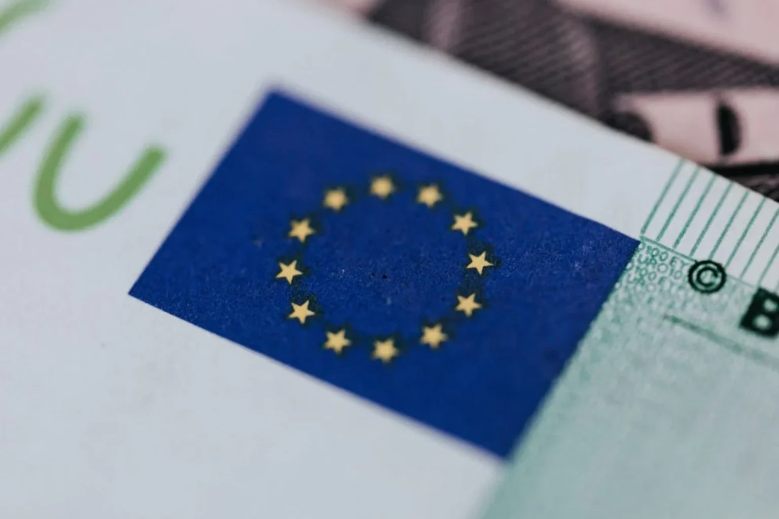 The flag of the European Union on a banknote, close-up.